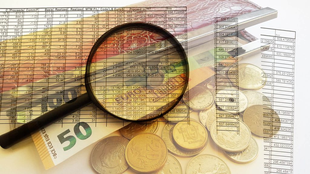 fifty-euro-bill-coins-magnifying-glass-financial-report-double-exposure-business-finance-money-concept-scaled-6.jpg